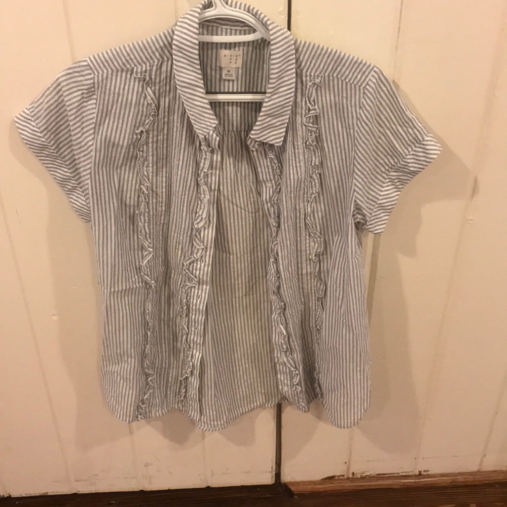 Striped button down blouse with ruffle accents
